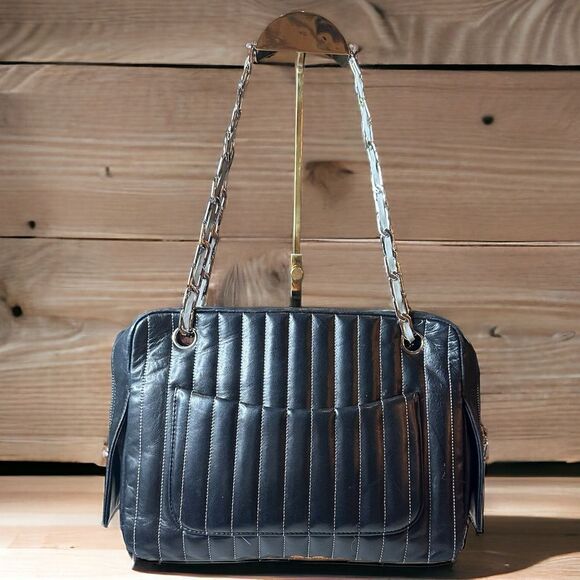 Chanel Mademoiselle Ligne Vertical Quilted Black Leather Camera Bag